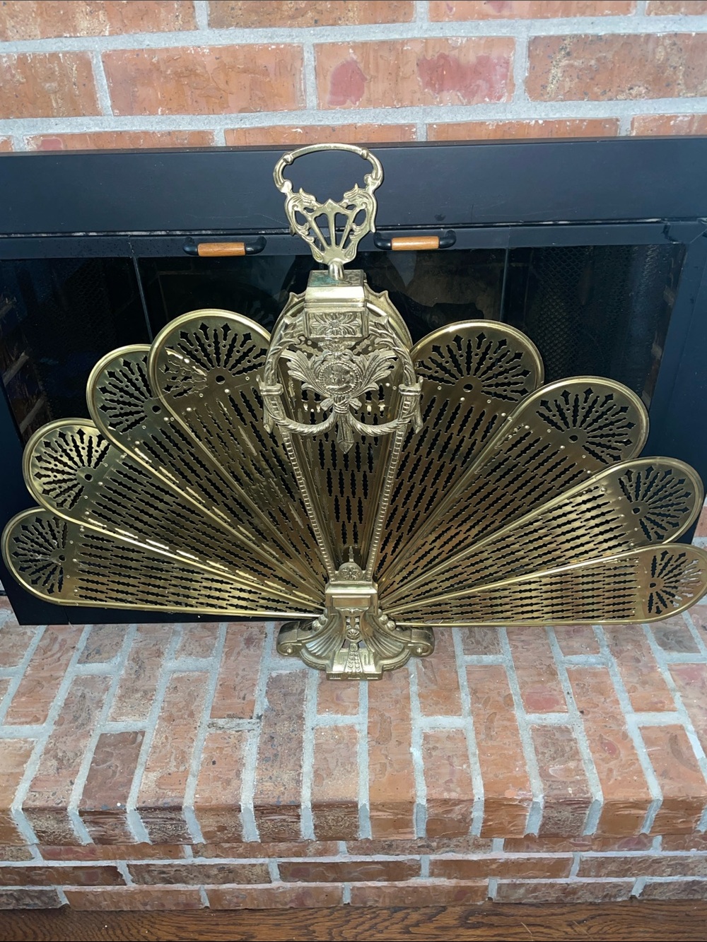 Antique (1930’s) peacock folding brass fireplace screen